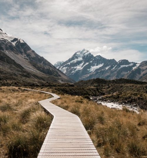 brown boardwalk mountains small